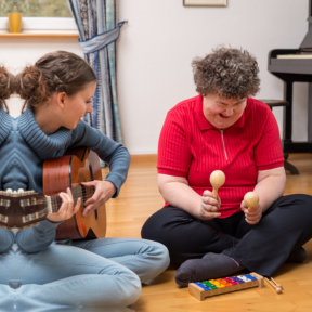 smiling woman playing with her toys
